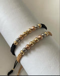 Juego pulsera con balines tres oros #5+ circon. X2